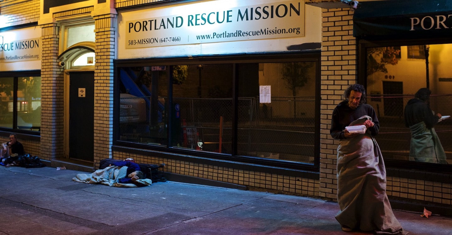 Homeless man standing outside Portland Rescue Mission